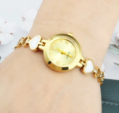 Montre à quartz électronique pour femme, cadran rose avec chiffres romains dorés 18K, bracelet en acier inoxydable, élégante et tendance.
